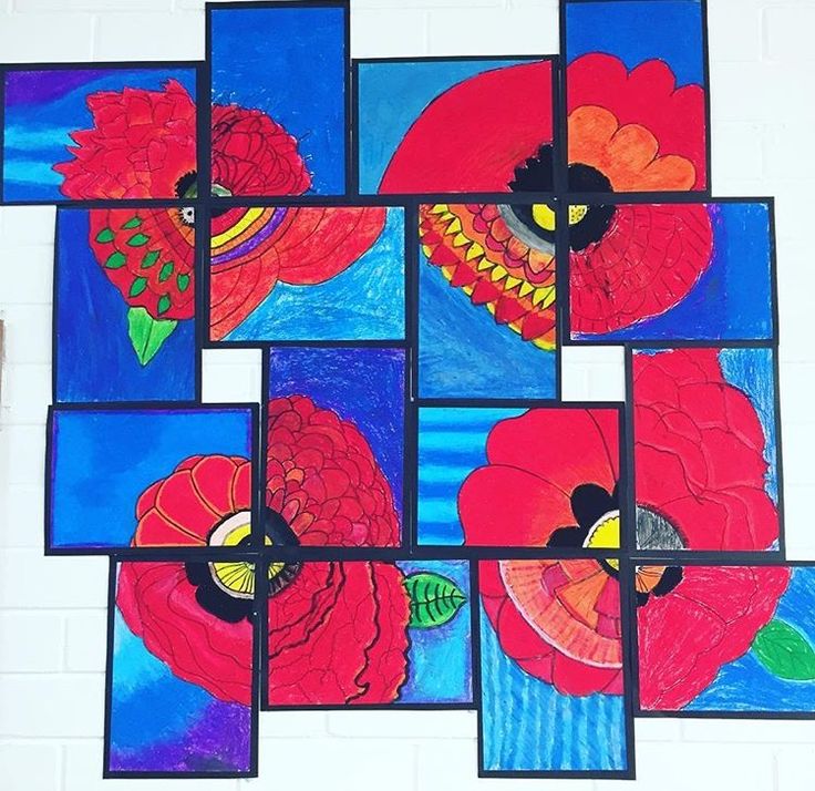 an art project made out of stained glass with flowers and leaves painted on the sides