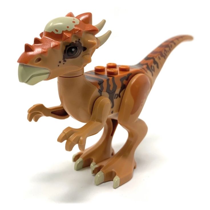 a toy dinosaur with an orange head and tail