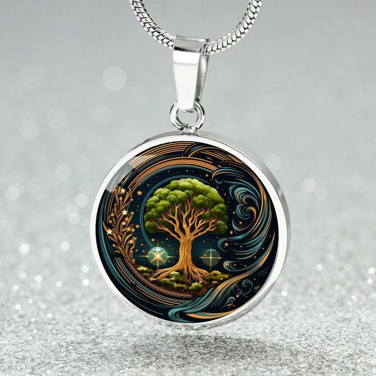 "Tree of Life Necklace is a celestial masterpiece with an intricately designed Tree of Knowledge, symbolizing the interconnectedness of the universe. This personalized charm pendant, reminiscent of the World Tree in astrology, embodies the beauty of galaxy jewelry, making it the perfect celestial gift for any occasion. ➜ Our Tree of Life Jewelry is made of high quality surgical steel with a graphic image that's printed directly onto the steel surface with a shatterproof liquid glass coating and Moon Phase Spiritual Jewelry, Symbolic Tree Of Life Round Pendant Jewelry, Silver Jewelry With Sun And Moon Design For Meditation, Symbolic Silver Tree Of Life Jewelry, Symbolic Silver Jewelry With Tree Of Life, Spiritual Sun And Moon Design Jewelry Gift, Spiritual Round Necklace With Artistic Design, Spiritual Sun And Moon Jewelry As Gift, Spiritual Round Necklaces With Artistic Design