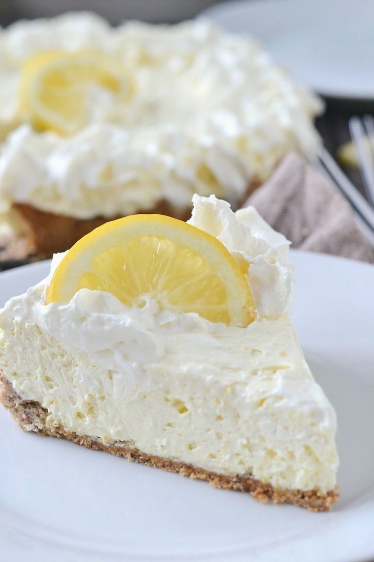 a slice of lemon pie on a white plate