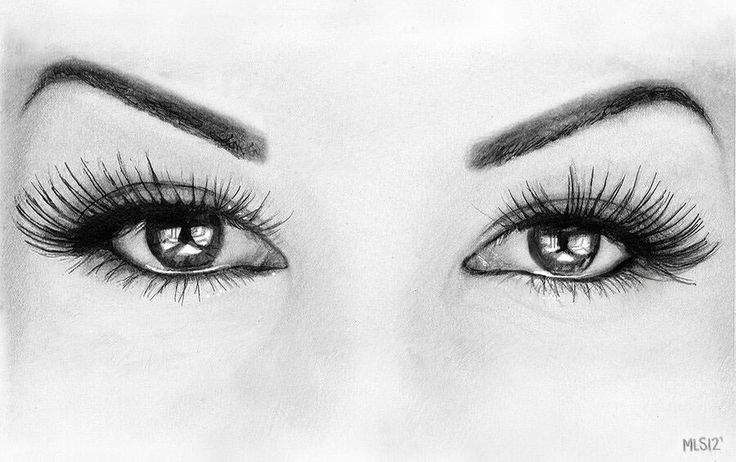 a woman's eyes with long eyelashes