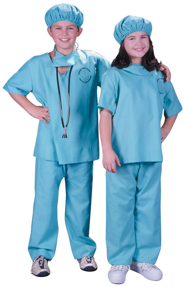 two children in scrubs standing next to each other