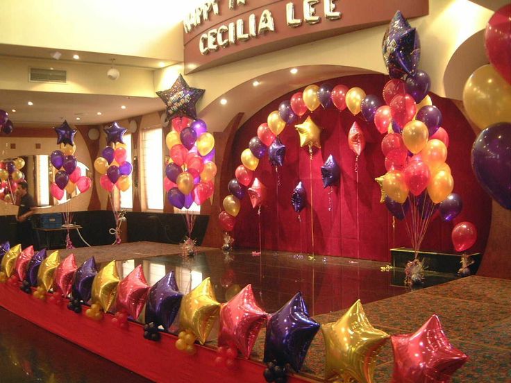 balloons and streamers are on display at a party