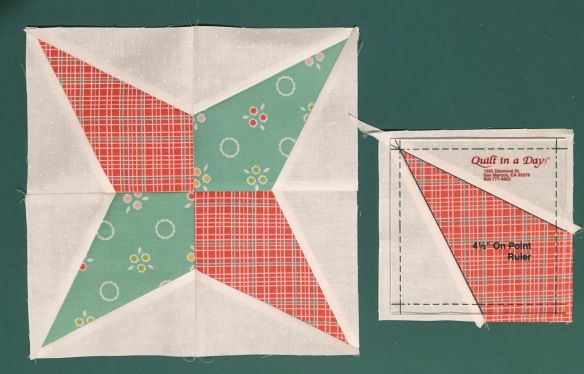 two pieces of quilted fabric are next to each other, one is folded in half and the other has an origami star on it