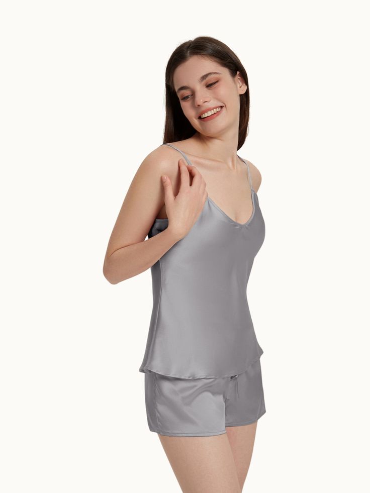 Simple elegance, very moving. A silky silk nightgown, as sexy as it is seductive. Make you fall in love with every night. Low-profile solid color matching, simple and pure is the bottom of the fundamental. Classic halter design, silky and delicate good cool, quality requirements details show, silk texture glossy moving. Silk in the natural animal protein rich in a variety of skin-needed amino acids, close to moisturize the skin texture silky, low coefficient of friction, the whole body is not ea Elegant Solid Sleepwear With Spaghetti Straps, Elegant Solid Color Summer Sleepwear, Summer Silk Sleepwear, Nighttime Satin Finish Camisole With Spaghetti Straps, Modal Satin Summer Sleepwear, Modal Satin Sleepwear For Summer, Night Satin Camisole With Spaghetti Straps, Satin Finish Spaghetti Strap Camisole For Night, Sleeveless Modal Satin Sleepwear