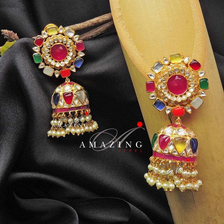 Silver Moissanite Polki Earring | Indian Wedding Jewelry | Indian Moissanite Polki Earring| Statement Earring Material : Silver Gemstone: Moissanite, Semi Precious Navratan Stones and Fresh Water Sea Pearls Stone colour: Uncut Polki Primary colour: Gold Size-Length: 60mm Width: 30mm Closure : Screw back and Clips Silver Intricate, hand crafted, Pure Silver Polki Earrings, studded with high quality Moissanite ,Semi Precious Navratan Stones and Fresh Water Sea Pearls Earring comes with screw back Fusion Kundan Jhumkas Drop Earrings, Kundan Fusion Jhumkas, Fusion Style Kundan Bridal Earrings, Heavy Multicolor Bridal Earrings In Fusion Style, Fusion Style Kundan Jhumkas, Fusion Style Bridal Earrings With Cutdana For Diwali, Fusion Bridal Earrings With Cutdana For Diwali, Multicolor Meenakari Fusion Bridal Earrings, Elegant Multicolor Round Jhumkas