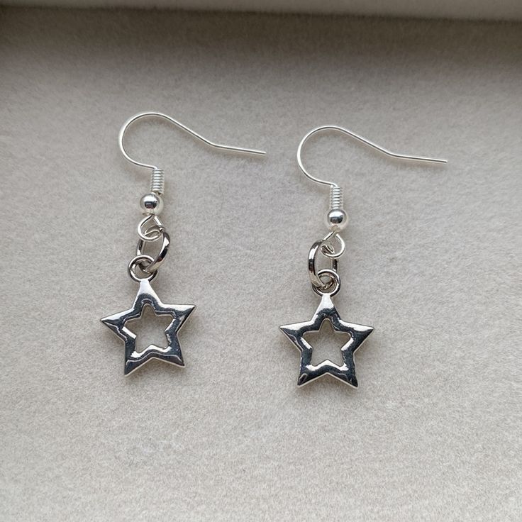 Handmade Silver Star Earrings. Fish Hook. Unused. In Good Condition. Tags: Handmade. Handmade Earrings. Handcrafted Earrings. Handcraft Earrings. Handcrafted Earrings. Handmade Silver Earrings. Handmade Silver Charm Earring. Handmade Charm Earring. Handmade Silver Charm Earrings. Handmade Charm Earrings. Handmade Charm Earring. Charm Earring. Earring. Earrings. Handmade Earrings. Silver Star Earring. Silver Star Earrings. Silver Earring. Silver Earrings. Earring. Earrings. Silver. Fish Hook Earr Silver Star-shaped Earrings With Ear Wire, Silver Star Charm Earrings For Everyday, Silver Earrings With Star Charm For Everyday, Silver Star-shaped Earrings As Gift, Silver Star-shaped Earrings, Silver Star-shaped Pierced Earrings, Handmade Silver Star Earrings, Star Earrings Silver, Dainty Fine Jewelry