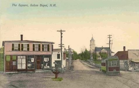 an old postcard shows the town's main street as it appears to be in disrepair