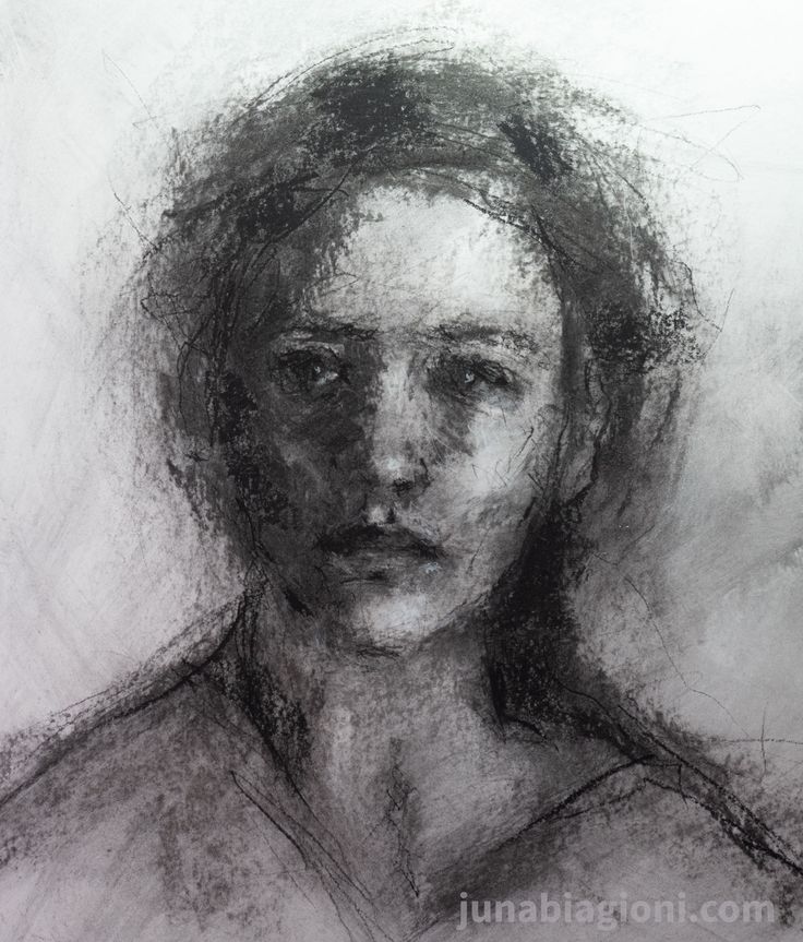 a black and white drawing of a woman's face