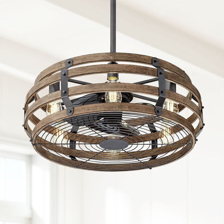 a wooden light fixture hanging from the ceiling