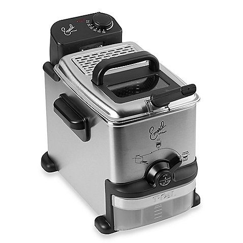 an electric deep fryer sitting on top of a white surface