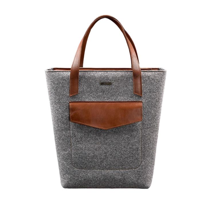 Elevate your everyday style with our Exclusive Women's Felt Shopper Bag, designed with luxurious leather inserts. Crafted from premium felt, this spacious and durable bag offers both functionality and sophistication. The rich leather accents add a touch of elegance, making it the perfect accessory for shopping, work, or weekend outings. With its unique blend of materials and timeless design, this exclusive shopper bag is a must-have for those who appreciate quality and style. Dimensions: 14.6 x 16.5 x 4.7 inches. Modern Bucket Bag With Leather Trim For Shopping, Modern Leather Trim Bucket Bag For Shopping, Daily Use Wool Bag With Leather Handles, Daily Use Wool Bags With Leather Handles, Daily Wool Bag With Leather Handles, Modern Laptop Bag With Leather Backing For Daily Use, Rectangular Bucket Bag With Leather Handles For Business, On-the-go Leather Trim Satchel Bucket Bag, Rectangular Wool Shoulder Bag For Travel