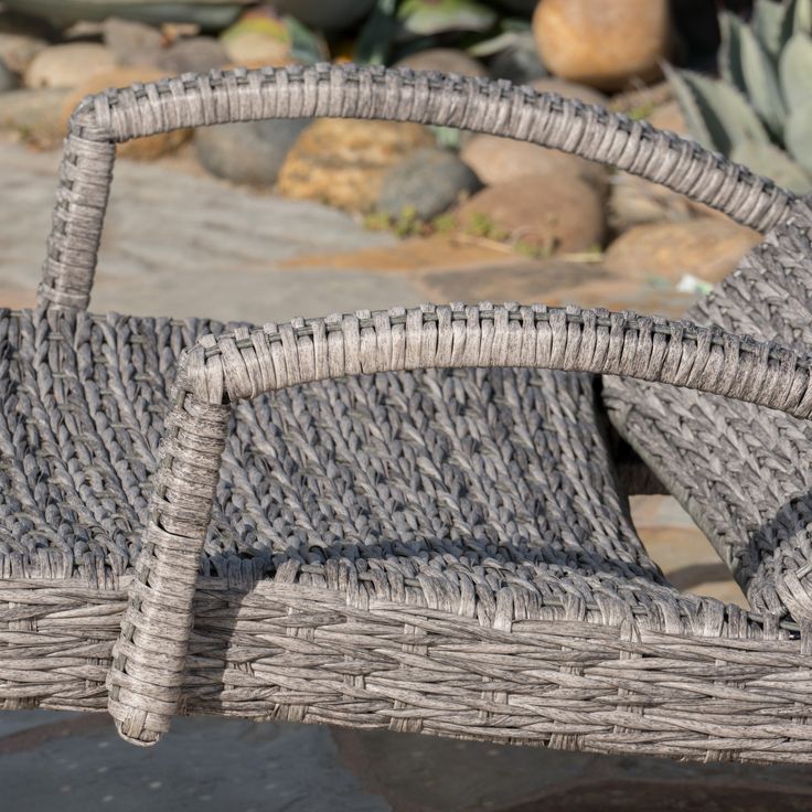 a wicker chair sitting on top of a table