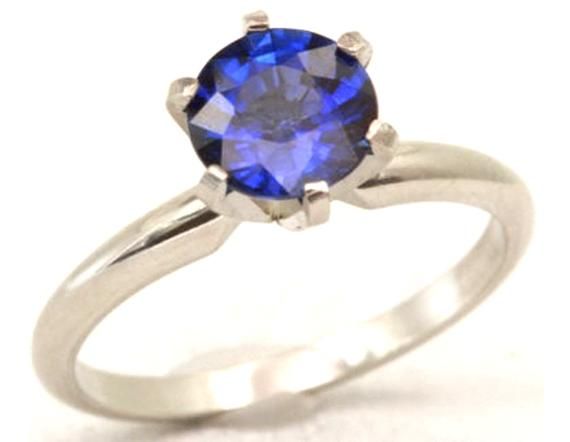 GEMSTONE DETAILS:BRAND NEW Natural Blue Sapphire Round CutAvailable in 5 different Stone Sizes 1.40CT Stone - 6.5 mm Diameter. Ring Height - 8.08 mm, Ring Width - 8.00 mm. Shank Width - 1.9mm1.70CT Stone - 7.0 mm Diameter. Ring Height - 8.56 mm, Ring Width - 8.65 mm. Shank Width - 1.9mm2.20CT Stone - 7.5 mm Diameter. Ring Height - 9.25 mm, Ring Width - 9.65 mm. Shank Width - 1.9mm2.60CT Stone - 8.0 mm Diameter. Ring Height - 9.95 mm, Ring Width - 10.65 mm. Shank Width - 1.9mm3.67CT Stone - 9.0 m Classic Royal Blue Round Sapphire Ring, Classic Royal Blue Round Ring, Tanzanite Wedding Jewelry With Diamond Cut, Wedding Tanzanite Diamond-cut Jewelry, Classic Blue Sapphire Ring With Round Stone, Wedding Jewelry With Diamond Cut Tanzanite, Blue Sapphire Solitaire Jewelry, Wedding Tanzanite Diamond Cut Jewelry, Royal Blue Round Jewelry With Brilliant Cut