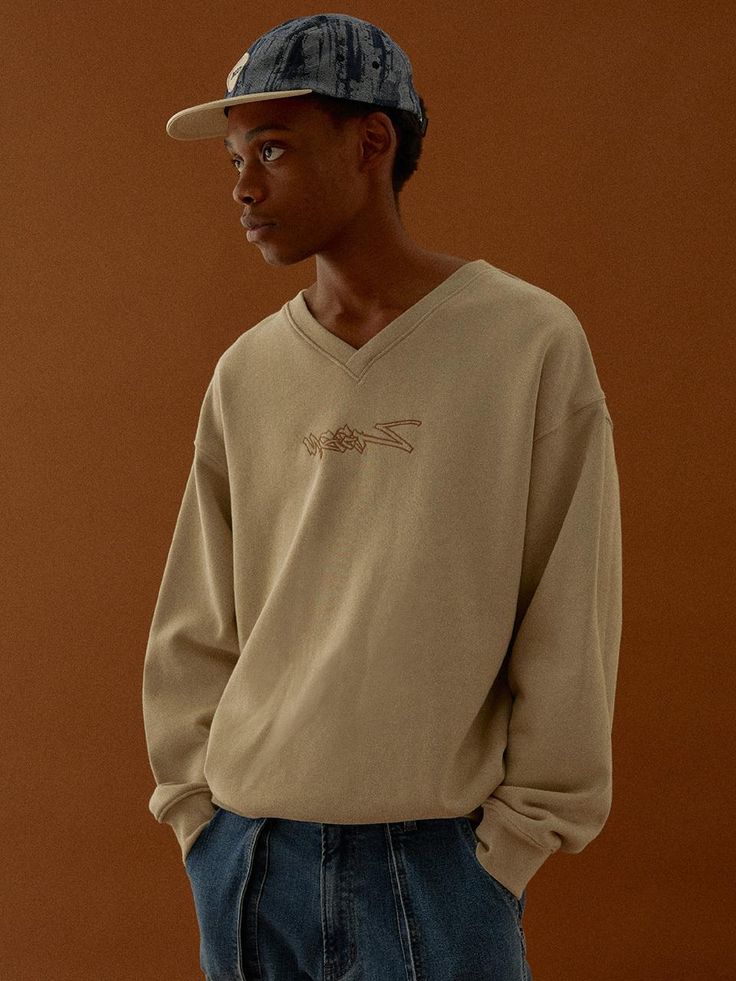 This is a comfortable and trendy sweatshirt by MAGOODGAN that is made out of high quality cotton 100% fabric. With unique design detail and trendy mood, it will stand out from your casual daily outfit. - Oversized loose silhouette- MGGN Chain embroidery on the front- Ribbed V neckline and cuffs Beige Cotton Sweatshirt For Streetwear, Oversized Beige Cotton Sweatshirt, Comfortable Relaxed Fit Sweatshirt For Streetwear, Casual French Terry Tops For Streetwear, Everyday Beige Cotton Sweatshirt, Beige Cotton Sweatshirt With Relaxed Fit, Casual French Terry Sweats With Drop Shoulder, Casual Cotton Drop Shoulder Sweatshirt, Oversized Beige Casual Sweatshirt