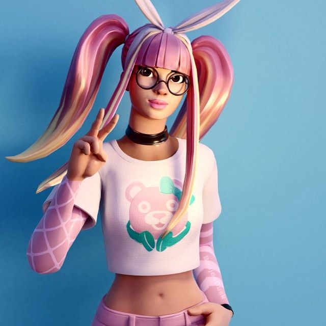 a barbie doll with pink hair and glasses holding her hand up to the side while standing against a blue background