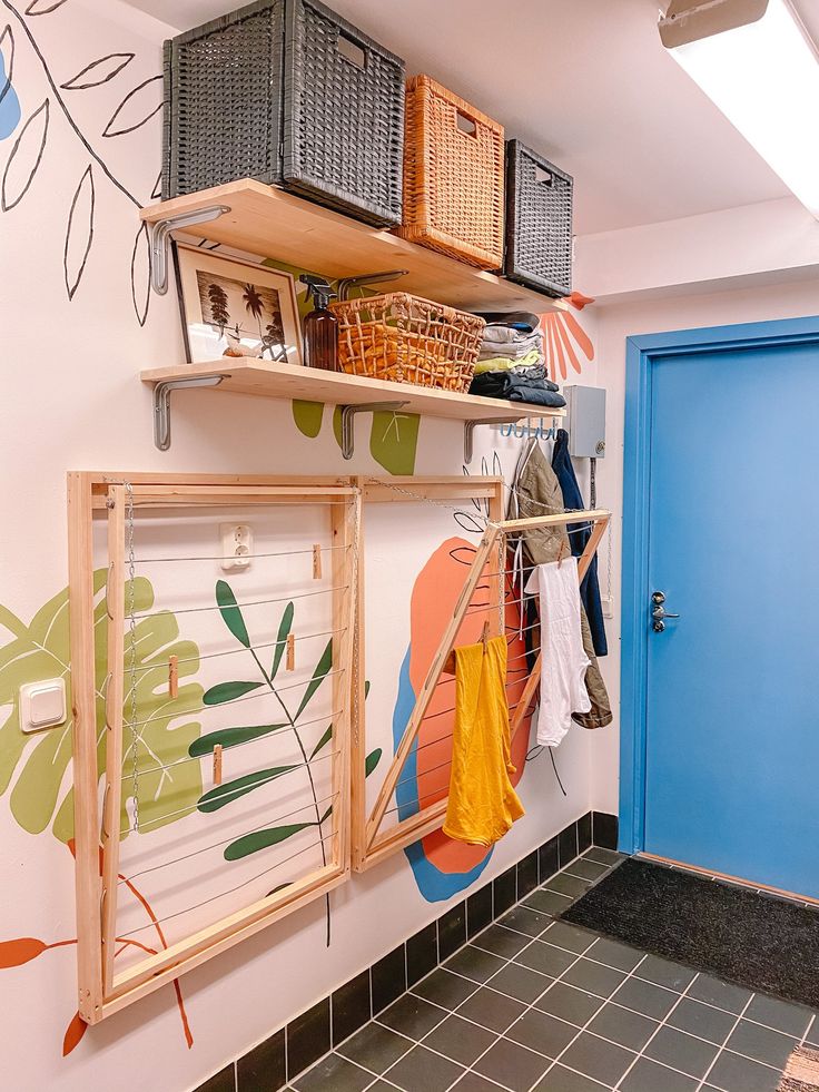 a blue door and some shelves in a room