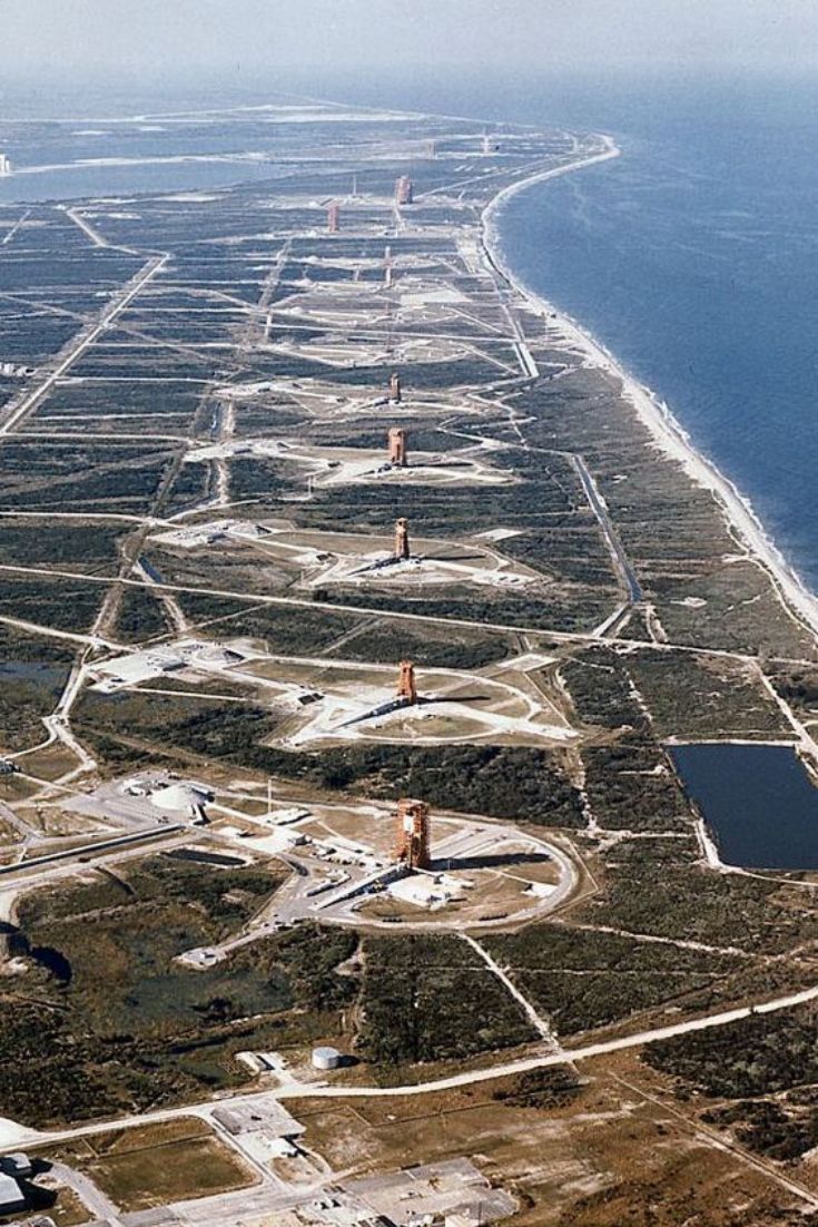 an aerial view of the ocean and land