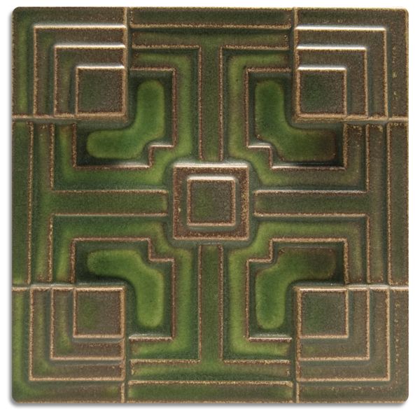 a square shaped tile with squares and rectangles in green, on a white background