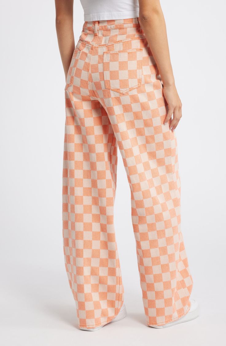 Made from sturdy cotton twill covered in a checkerboard print, these playful pants are designed with a high waist and baggy legs that pool at the hems. Exclusive retailer 32" inseam; 26" leg opening; 15" front rise; 18" back rise (size 14) Zip fly with button closure Five-pocket style 100% cotton Machine wash, line dry Imported Cottagecore Bottoms, How To Style Orange Pants, Colorful Pants Outfit, Fun Pants Outfit, Artsy Jeans, High Waist Baggy Pants, Vibrant Clothes, Preppy Jeans, Colorful Jeans