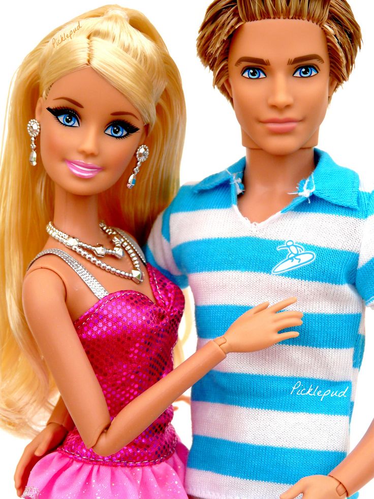 two barbie dolls standing next to each other in front of a white background with blue eyes