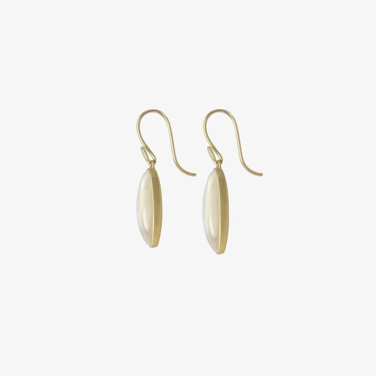 Details Lola Brooks 18k yellow gold & long oval moonstone drop earrings, 10.33ct. Each stone measures approximately 7/8″ x 1/4″ & is set in Lola's signature fine bezel. When hanging, the earrings measure approximately 1 1/4″ from the top of the 18k yellow gold ear wire to the bottom of the earring. - moonstone, 10.33ct - 18k yellow gold - 1 1/4" total length - each earring weighs 2.79g Elegant Gold Pearl Earrings With Polished Finish, Timeless Oval Everyday Earrings, Timeless Oval Earrings For Everyday, Yellow Gold Cabochon Drop Earrings, Gold Teardrop Cabochon Jewelry, Formal Long Drop Jewelry With Polished Finish, Elegant 14k Gold Linear Earrings With Polished Finish, Oval Yellow Gold Jewelry With High Luster, Elegant Polished Linear Earrings As Gift