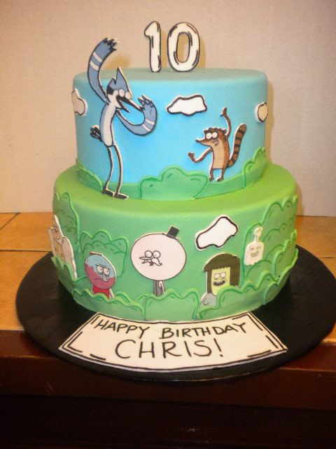 two tiered birthday cake with cartoon characters on it