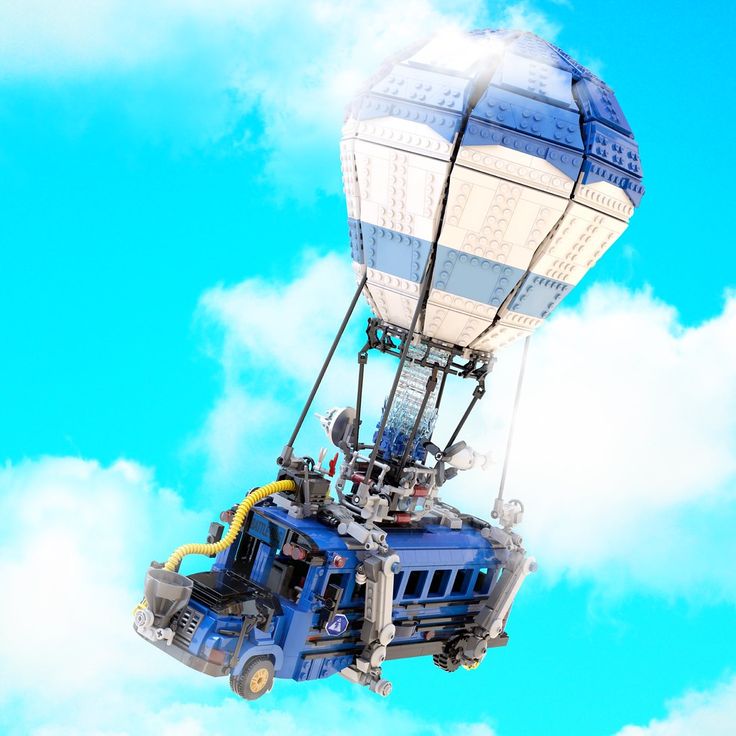 a blue and white hot air balloon in the sky