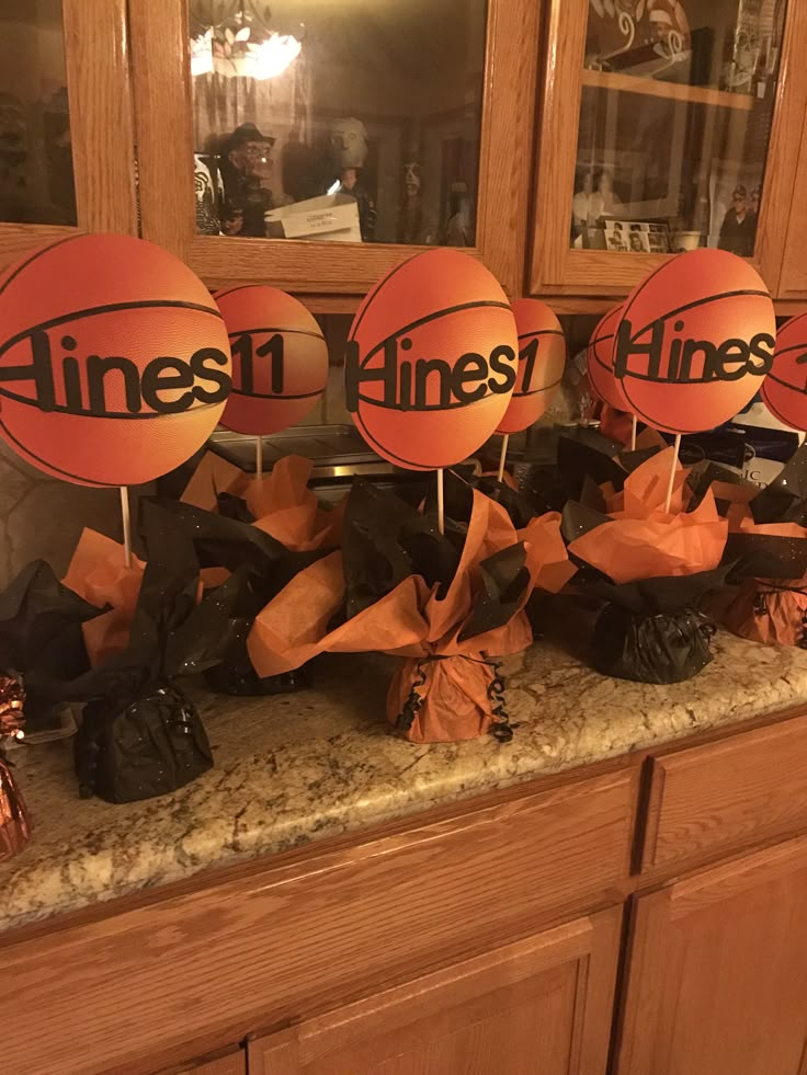 an assortment of basketballs and candy on a counter with the word minnesota in black