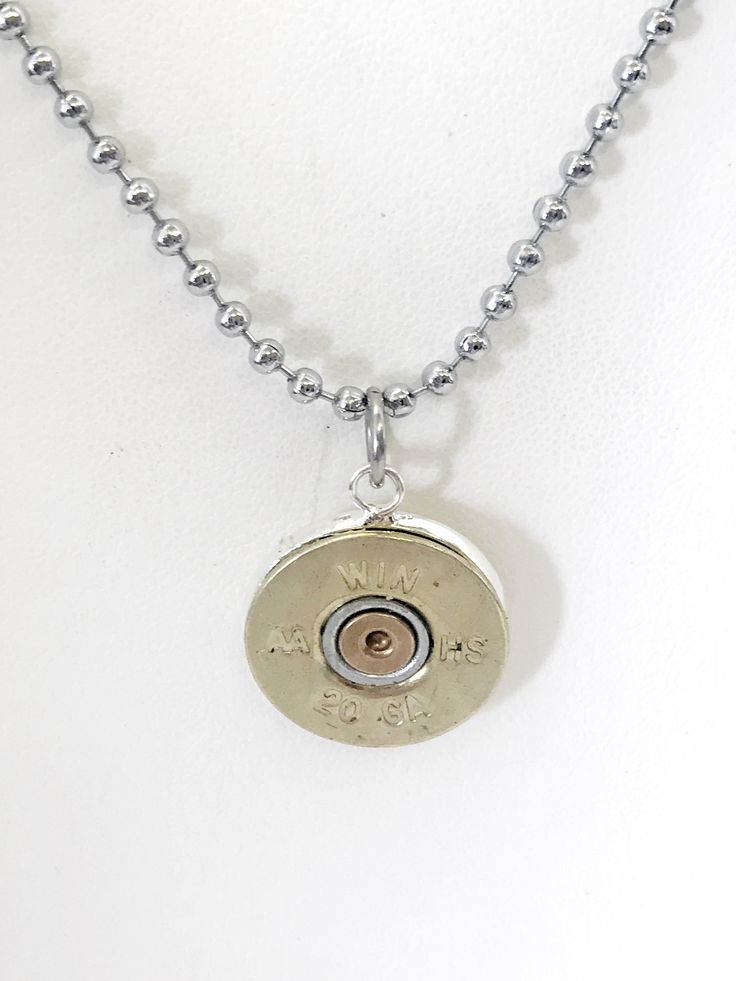 This necklace would make a great graduation or Father's Day gift. The pendant is a cut 20g shotgun shell head on a 24 inch stainless steel ball chain. The pendant is also available for individual purchase if you have another chain on which you would like to wear it. Each necklace comes boxed and ready to give as a gift. This jewelry item has small parts and is not intended for anyone under the age of 14. To see the latest items and specials, follow me on Facebook, Instagram, and Pinterest. Faceb Shotgun Shell Jewelry, Mustard Seed Jewelry, Bullet Necklace, Faith Jewelry, Jewelry Mens, Shotgun Shell, Shooting Sports, Faith Gifts, Shell Necklace