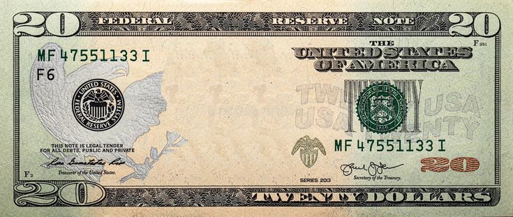 a twenty dollar bill with an image of the united states on it's front