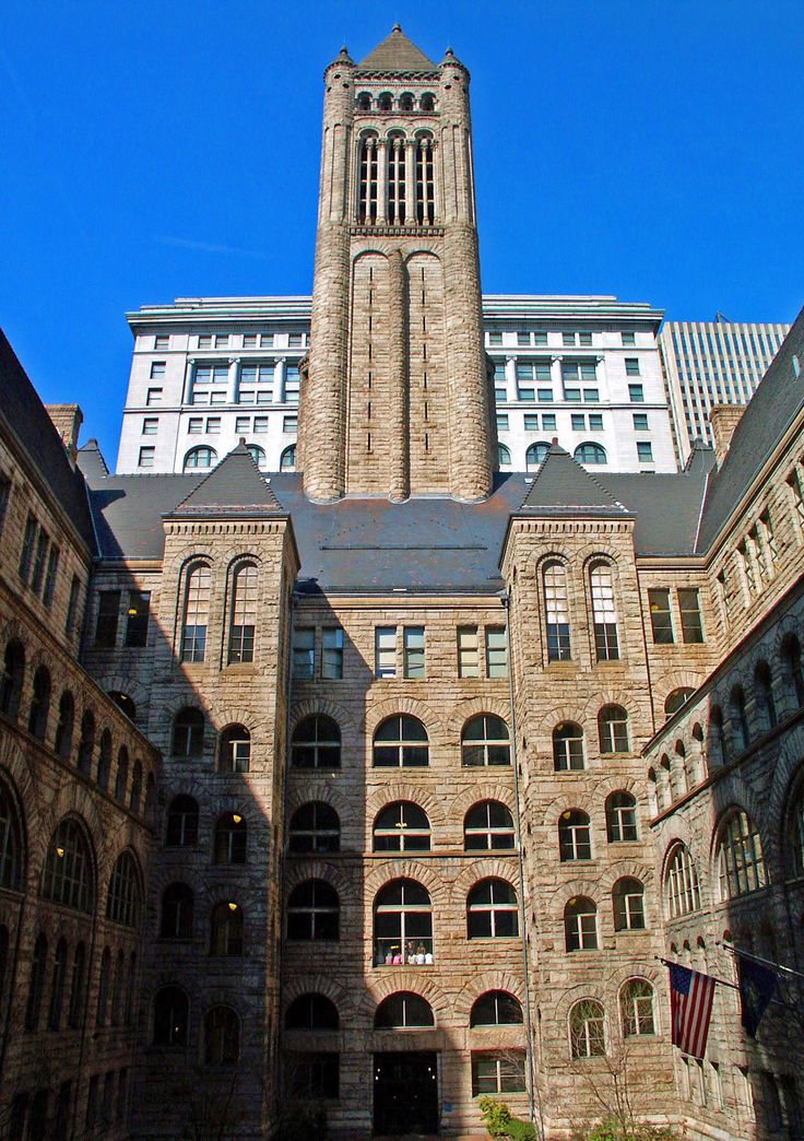 an old building with a clock tower in the middle