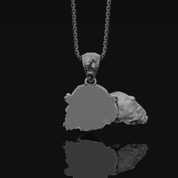 Introducing the Hypnos Pendant - a stunning piece of jewelry honoring the Greek God of Sleep. This stunning pendant is crafted from sterling silver and is sure to be a cherished addition to any jewelry collection. Featuring the silhouette of Hypnos, the God of Sleep, this pendant is sure to fascinate and inspire. Through this unique pendant, explore the power of mystery and sleep in all its forms. Sleep has always had a mysterious power, and Hypnos was associated with dream interpretations and prophetic abilities. By wearing this pendant, you can honor the wisdom of sleep, and can explore these themes in a creative and accessible way. The Hypnos Pendant is made from solid sterling silver and features classic detailing. The pendant is presented on a dainty chain, perfect for layering with o Metal Necklace With Polished Finish For Gift, Polished Metal Necklace For Gift, Amulet Style Jewelry With Polished Finish As Gift, Stainless Steel Jewelry With Large Pendant As Gift, White Gold Pendant Jewelry, Polished Stainless Steel Pendant Necklaces, Unique Stainless Steel Jewelry With Polished Finish, Stainless Steel Large Pendant Jewelry Gift, Symbolic Sterling Silver Pendant Jewelry