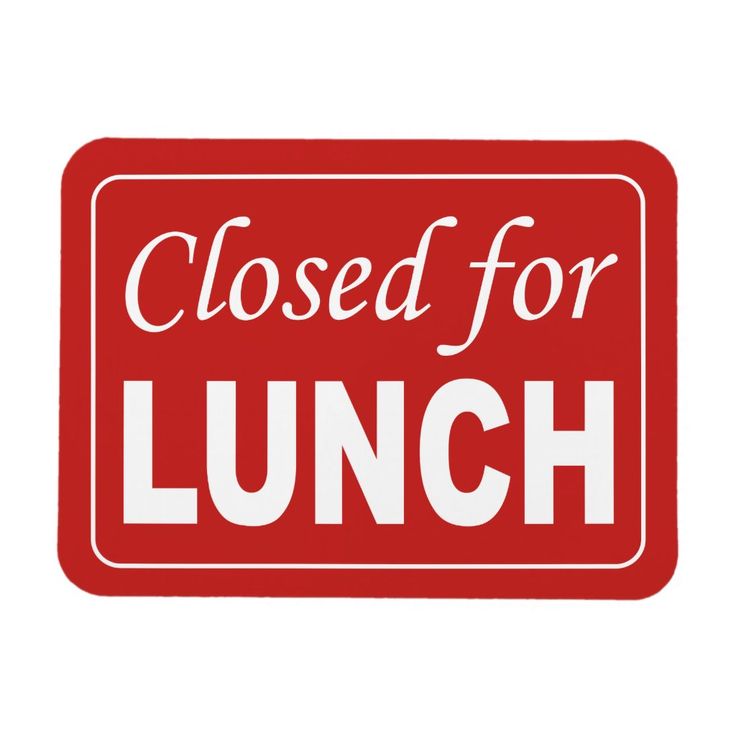 a red sign that says closed for lunch