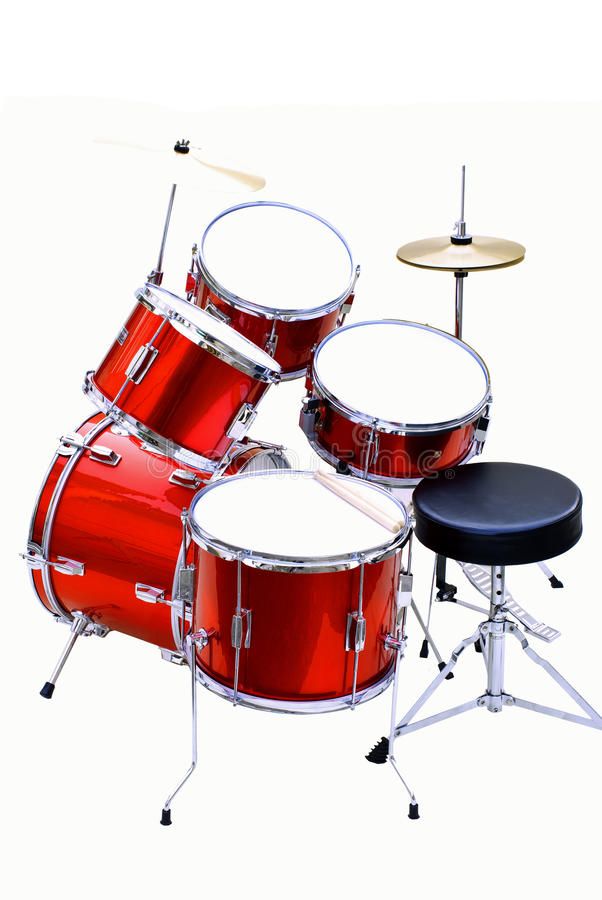 a red drum set sitting on top of a white floor next to a black stool