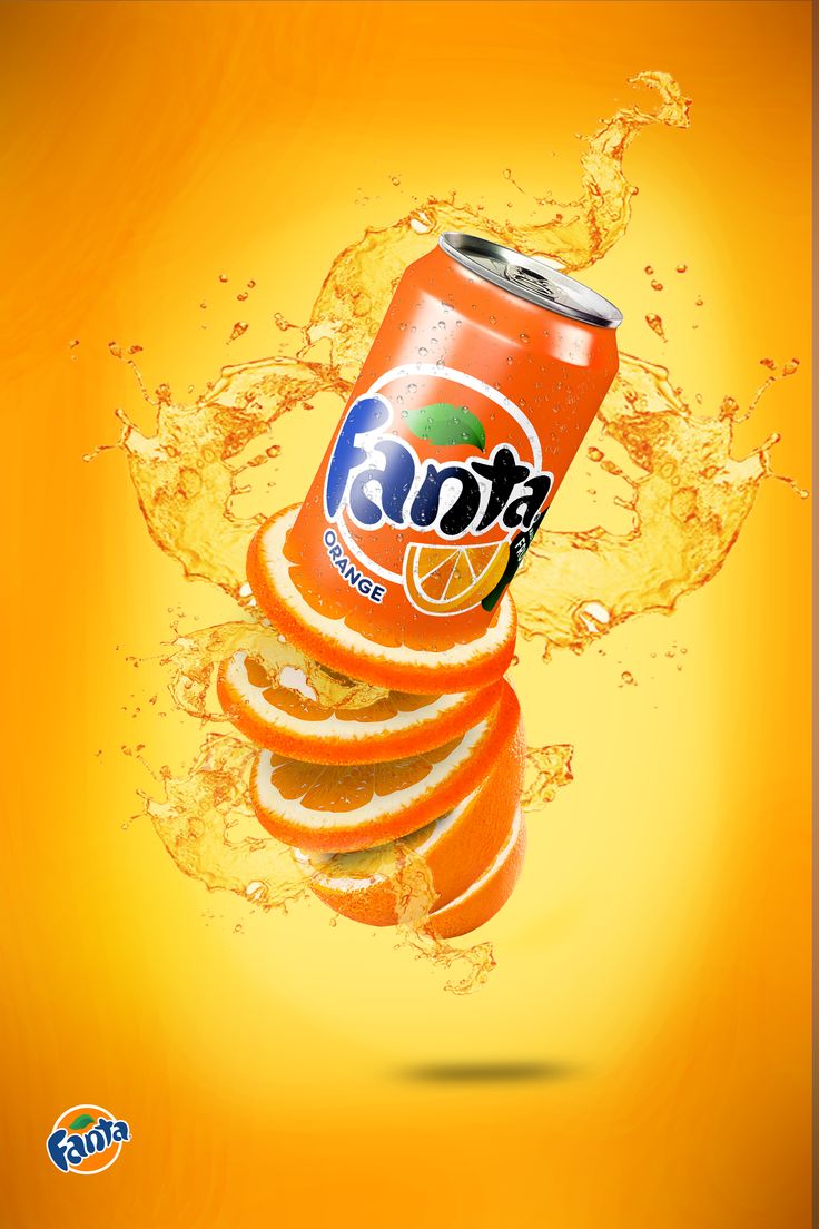 an orange soda can is in the air with water splashing around it and on top of sliced oranges