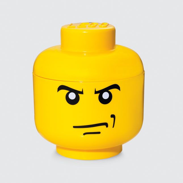 a yellow lego head is shown with eyes on it's face, and has an angry expression