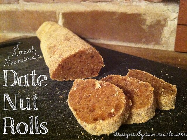 three pieces of bread sitting on top of a cutting board with the words date nut rolls next to it