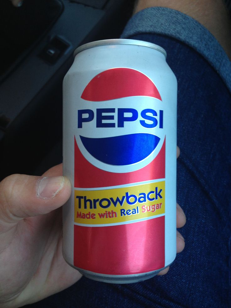 a person holding a can of pepsi in their left hand, with the word throwback on it