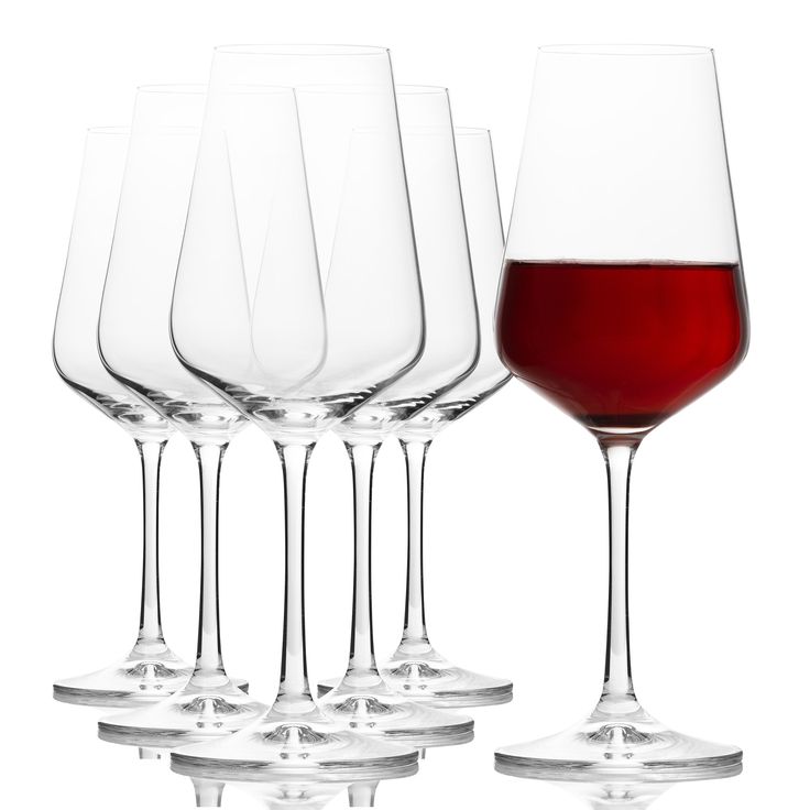 six wine glasses with red wine in them