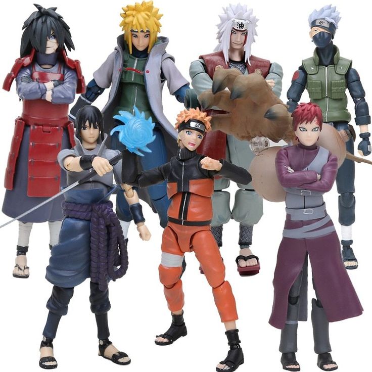 several action figures are posed together on a white background with one being an anime character