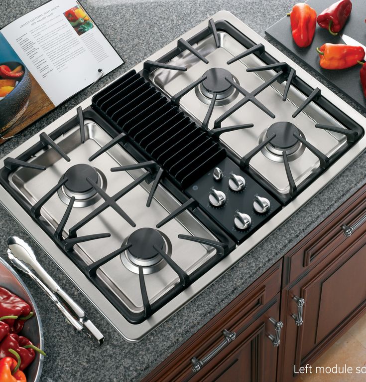 an image of a stove top that is in the kitchen