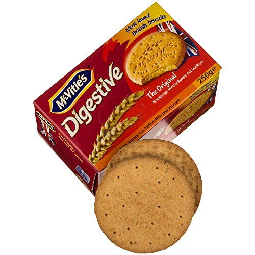 a box of biscuits next to a package of crackers on a white background with clippings