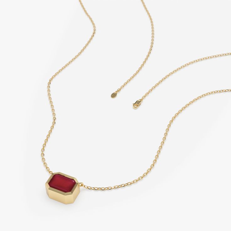 Luisa The sweetest ruby to graze your neck in a modern octagon cut. This dainty necklace will be a staple in your jewelry box, or maybe never make it there because you will never want to take it off! It stacks beautifully with other dainty necklaces and adds a stunning pop of rich color. It makes a beautiful gift for a loved one as well! - Handmade- Solid Gold- Natural Ruby- Total Ruby Carat Weight: 1.16 ctw- Dimensions of Setting: 6 mm x 8 mm All pieces come beautifully boxed in suede pouches y Modern Red Ruby Jewelry, Luxury Ruby Jewelry Radiant Cut, Luxury Radiant Cut Ruby Jewelry, Modern Ruby Gemstone Jewelry, Luxury Emerald Cut Ruby Jewelry, Fine Jewelry Ruby With Radiant Cut, Classic Radiant Cut Red Jewelry, Formal Octagon Ruby Jewelry, Classic Red Radiant Cut Jewelry