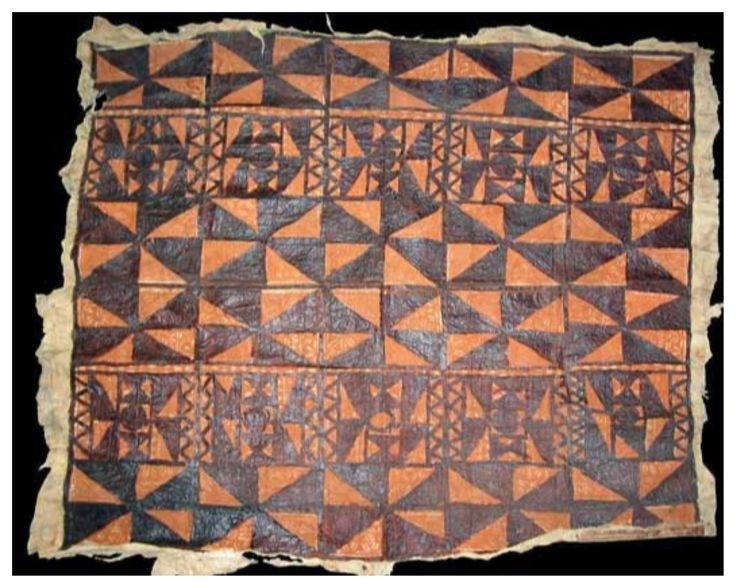 an old piece of cloth with geometric designs on it