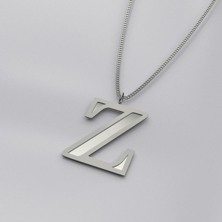 This silver initial letter necklace comes in either silver plating or sterling silver. This necklace is hypoallergenic and free from brass, nickel and lead. The pendant is 3/4in (20mm), with a 18in(48cm) chain and 2in(5cm) extension. For the sterling silver version, the charms & chains are solid 925 sterling silver. This is also an option to upgrade your sterling silver charm to a larger version of 1in. The initial is in Abhaya Libre Extrabold font and its outline is engraved to create a unique design Check out my other listings for other initials and designs. Please note that our necklace length image is a guide only. The necklace may sit lower or high depending on a person's build, height, age and neck size/width. Each person is different. Unlike stainless steel, sterling silver is prone Modern Silver Initial Pendant Name Necklace, Z Necklace, Jewelry Reference, Z Letter, Letter Necklace Silver, Initial Letter Necklace, Personalised Jewellery, Necklace Initial, Silver Chain Style