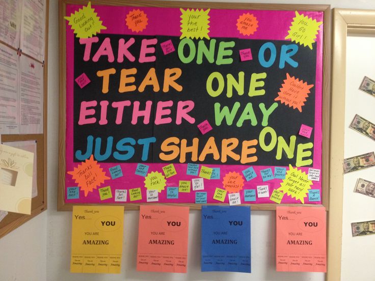 a bulletin board with post it notes attached to it and some money on the wall