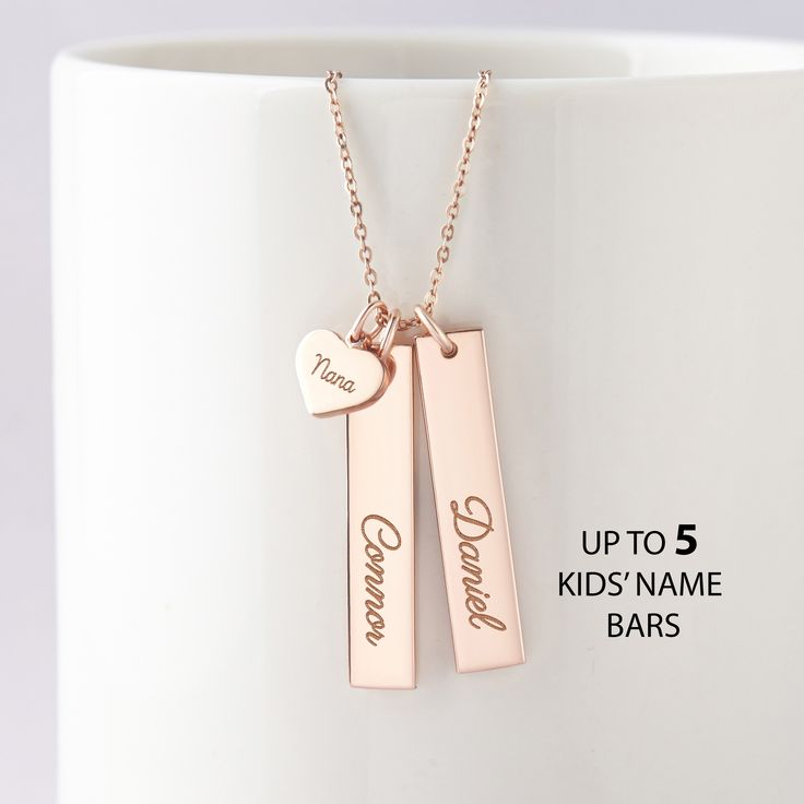 "This beautiful grandma necklace is engraved with your children's names on each charm. It's a perfect gift for your loved one with up to 5 personalized charms. PRODUCT INFO * Material: Solid 925 Sterling Silver * Dimensions: Bar charm measures ~ 1 1/4\" x 1/4\" (32 x 6.5mm). Heart charm measures ~3/8\"x5/16\" (9.5 x 8.2mm) * Word limits: 1 name/charm * By default, silver charm comes with BLACK engraving and gold-plated charm comes with CLEAR engraving HOW TO ORDER * Select your preferred finishi Heart Pendant Charm Necklace For Birthday And Mother's Day, Mother's Day Birthstone Nameplate Charm Necklaces, Mother's Day Birthstone Nameplate Charm Necklace, Mother's Day Nameplate Birthstone Charm Necklace, Mother's Day Nameplate Birthstone Necklace, Personalized Necklace For Birthday And Valentine's Day, Customizable Charm Necklace For Valentine's Day And Birthdays, Personalized Rose Gold Name Necklace, Customizable Charm Necklaces For Birthday And Valentine's Day