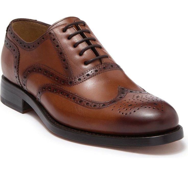 A Wingtip Leather Oxford That Will Stand The Test Of Time. Round Wingtip Toe Lace-Up Vamp Leather Construction Broguing And Topstitching Leather Upper And Sole Brown Leather Shoes With Brogue Detailing, Classic Wingtip Oxford Shoes For Business Casual, Classic Wingtip Oxford For Business Casual, Classic Formal Derby Shoes With Perforated Toe Box, Cognac Wingtip Shoes For Business Casual, Classic Wingtip Oxford With Rubber Sole, Cognac Wingtip Oxfords For Semi-formal Occasions, Classic Brown Wingtip Derby Shoes, Classic Brogue Oxford Shoes For Semi-formal Occasions