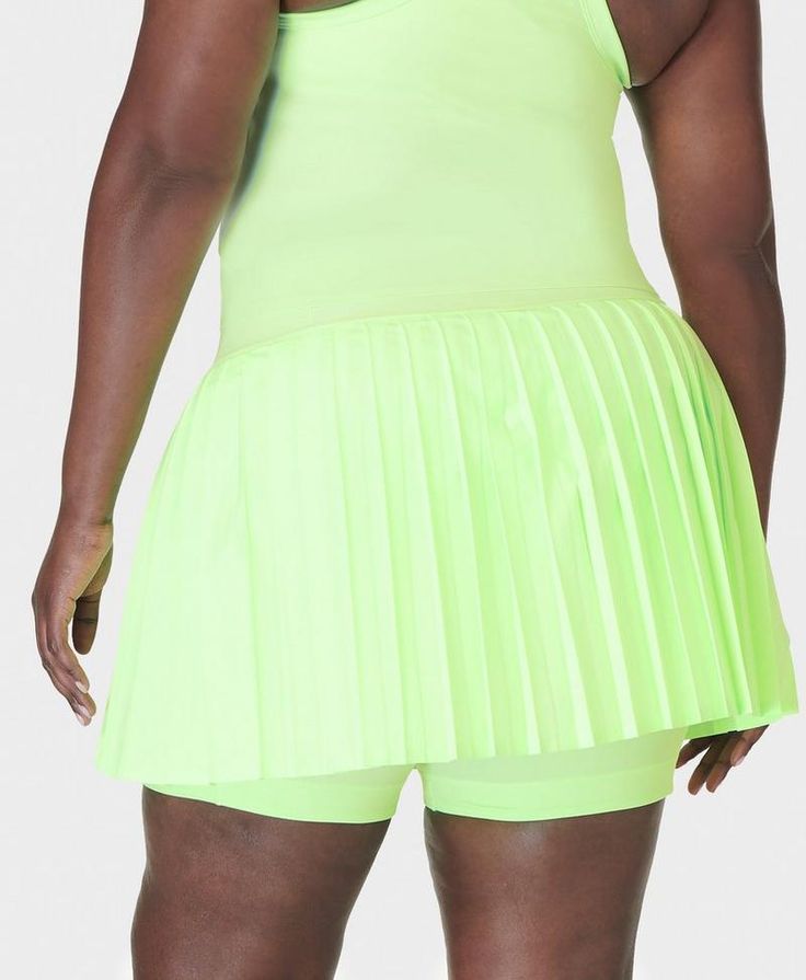 Our new performance skirt for days on the court. Sweat-wicking, anti-bacterial fabric keeps you cool and dry. A-line silhouette with pleated skirt and back panel. Supportive, in-built shorts are hemmed with silicone grippers to stay put as you move. Two side slip pockets on inner shorts. Front length: 35cm / 14". Model wears size L and is 178cm/5'10" tall. Style Code: SB9290Colour: Matcha Green Match Point, Linen Loungewear, Green Power, Tennis Skort, Matcha Green, How To Iron Clothes, Sweaty Betty, Clothing Care, Cashmere Coat